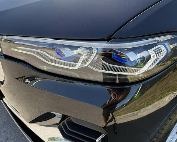 Черный БМВ X7, объемом двигателя 3 л и пробегом 180 тыс. км за 56000 $, фото 6 на Automoto.ua