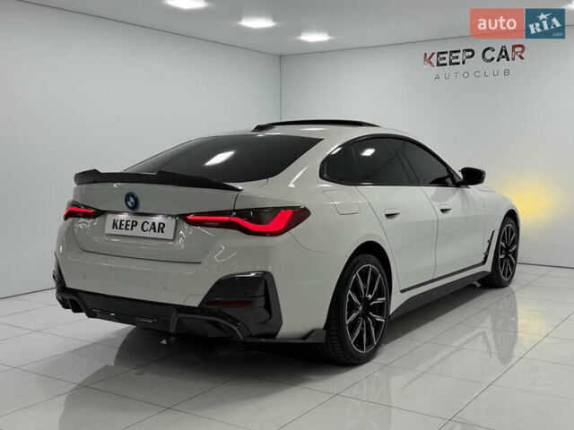 Белый БМВ i4, объемом двигателя 0 л и пробегом 50 тыс. км за 33000 $, фото 4 на Automoto.ua