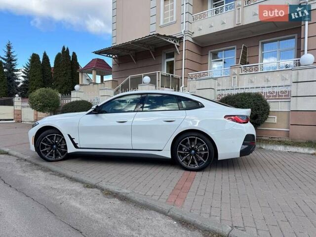 Белый БМВ i4, объемом двигателя 0 л и пробегом 20 тыс. км за 36999 $, фото 4 на Automoto.ua
