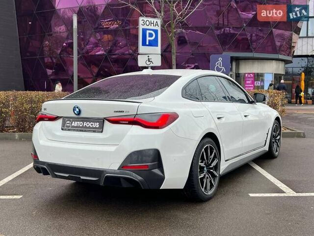 Белый БМВ i4, объемом двигателя 0 л и пробегом 20 тыс. км за 35990 $, фото 7 на Automoto.ua
