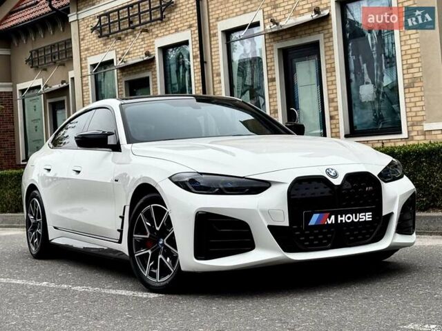 Белый БМВ i4, объемом двигателя 0 л и пробегом 45 тыс. км за 55900 $, фото 1 на Automoto.ua