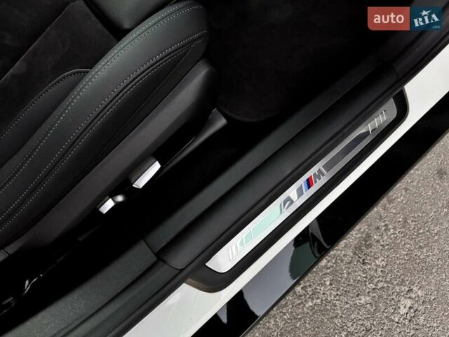 Белый БМВ i4, объемом двигателя 0 л и пробегом 45 тыс. км за 55900 $, фото 44 на Automoto.ua