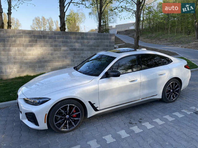 Белый БМВ i4, объемом двигателя 0 л и пробегом 40 тыс. км за 42499 $, фото 4 на Automoto.ua