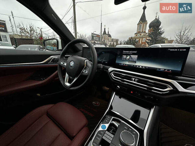 Белый БМВ i4, объемом двигателя 0 л и пробегом 5 тыс. км за 35500 $, фото 1 на Automoto.ua