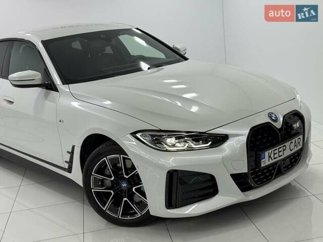 Белый БМВ i4, объемом двигателя 0 л и пробегом 11 тыс. км за 40900 $, фото 2 на Automoto.ua