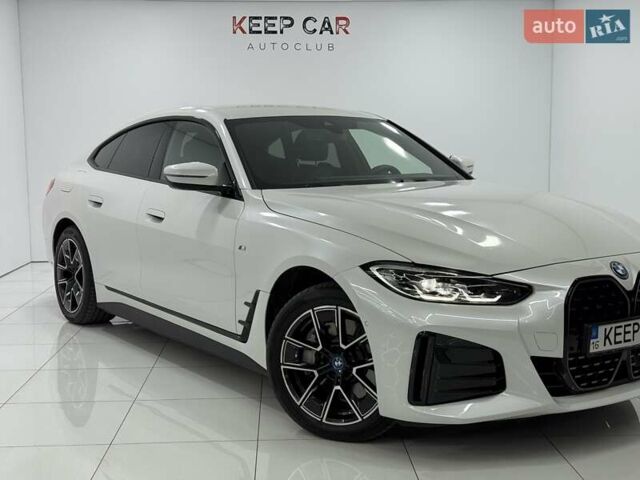 Белый БМВ i4, объемом двигателя 0 л и пробегом 11 тыс. км за 40900 $, фото 1 на Automoto.ua