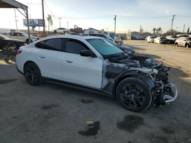 Белый БМВ i4, объемом двигателя 0 л и пробегом 18 тыс. км за 15900 $, фото 2 на Automoto.ua