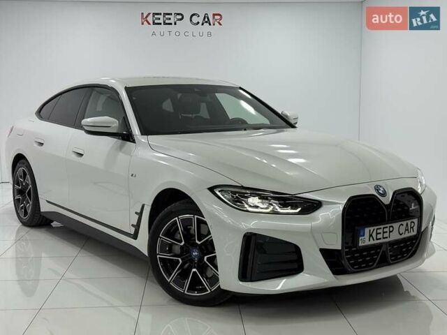 Белый БМВ i4, объемом двигателя 0 л и пробегом 11 тыс. км за 40900 $, фото 3 на Automoto.ua