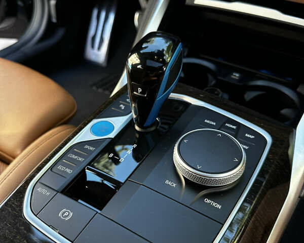 Черный БМВ i4, объемом двигателя 0 л и пробегом 33 тыс. км за 52000 $, фото 23 на Automoto.ua