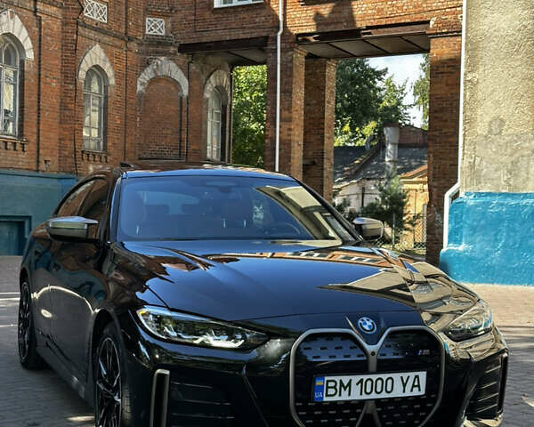 Черный БМВ i4, объемом двигателя 0 л и пробегом 33 тыс. км за 52000 $, фото 1 на Automoto.ua