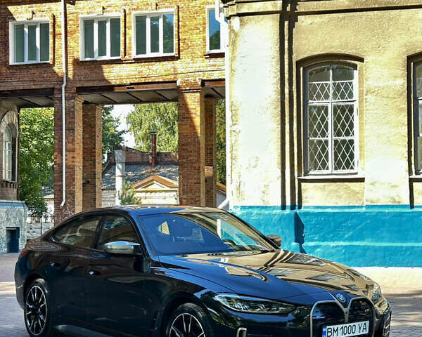 Черный БМВ i4, объемом двигателя 0 л и пробегом 33 тыс. км за 52000 $, фото 2 на Automoto.ua