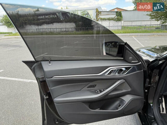 Черный БМВ i4, объемом двигателя 0 л и пробегом 31 тыс. км за 39900 $, фото 22 на Automoto.ua