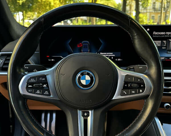 Черный БМВ i4, объемом двигателя 0 л и пробегом 33 тыс. км за 52000 $, фото 18 на Automoto.ua
