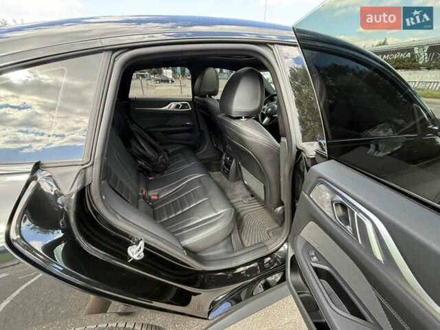 Черный БМВ i4, объемом двигателя 0 л и пробегом 31 тыс. км за 39900 $, фото 41 на Automoto.ua