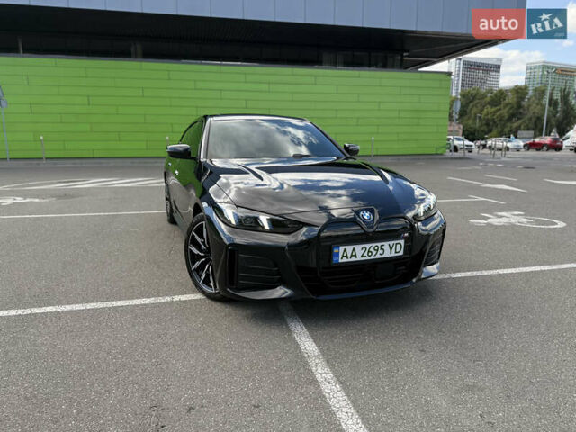 Черный БМВ i4, объемом двигателя 0 л и пробегом 31 тыс. км за 39900 $, фото 1 на Automoto.ua