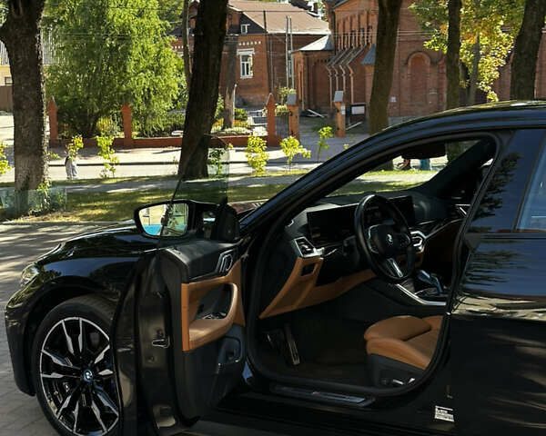 Черный БМВ i4, объемом двигателя 0 л и пробегом 33 тыс. км за 52000 $, фото 8 на Automoto.ua