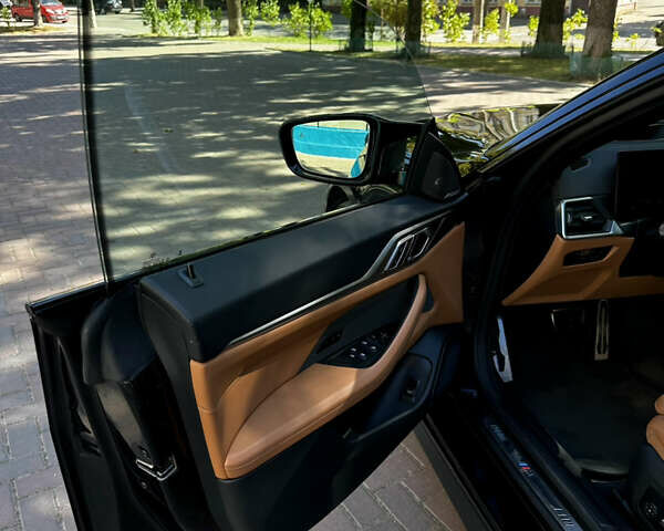 Черный БМВ i4, объемом двигателя 0 л и пробегом 33 тыс. км за 52000 $, фото 15 на Automoto.ua