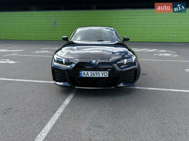 Черный БМВ i4, объемом двигателя 0 л и пробегом 31 тыс. км за 39900 $, фото 2 на Automoto.ua