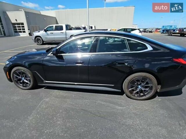 Черный БМВ i4, объемом двигателя 0 л и пробегом 40 тыс. км за 28000 $, фото 1 на Automoto.ua