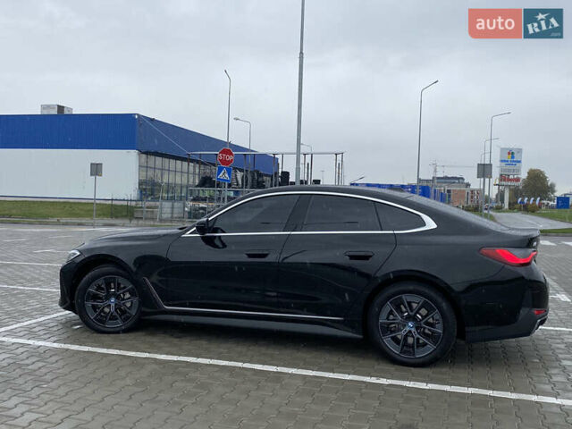Черный БМВ i4, объемом двигателя 0 л и пробегом 7 тыс. км за 38200 $, фото 12 на Automoto.ua