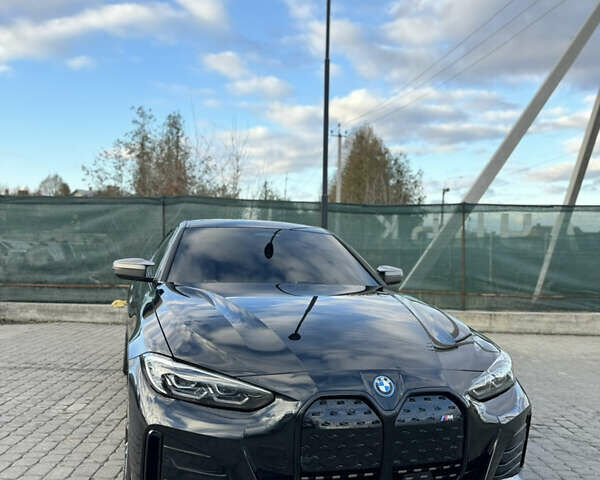 Черный БМВ i4, объемом двигателя 0 л и пробегом 40 тыс. км за 44800 $, фото 1 на Automoto.ua