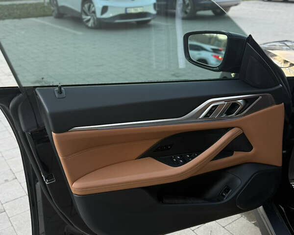 Черный БМВ i4, объемом двигателя 0 л и пробегом 17 тыс. км за 31999 $, фото 27 на Automoto.ua