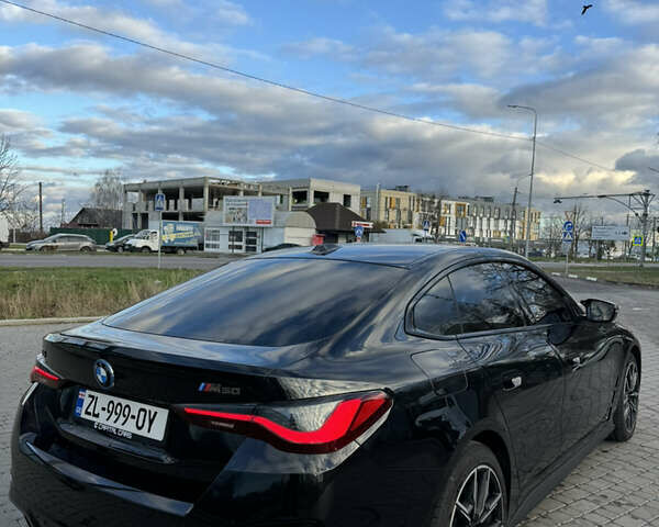 Черный БМВ i4, объемом двигателя 0 л и пробегом 40 тыс. км за 44800 $, фото 12 на Automoto.ua