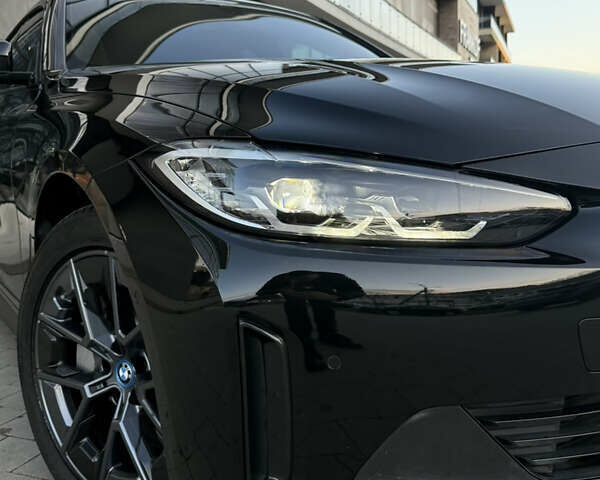Черный БМВ i4, объемом двигателя 0 л и пробегом 17 тыс. км за 31999 $, фото 11 на Automoto.ua