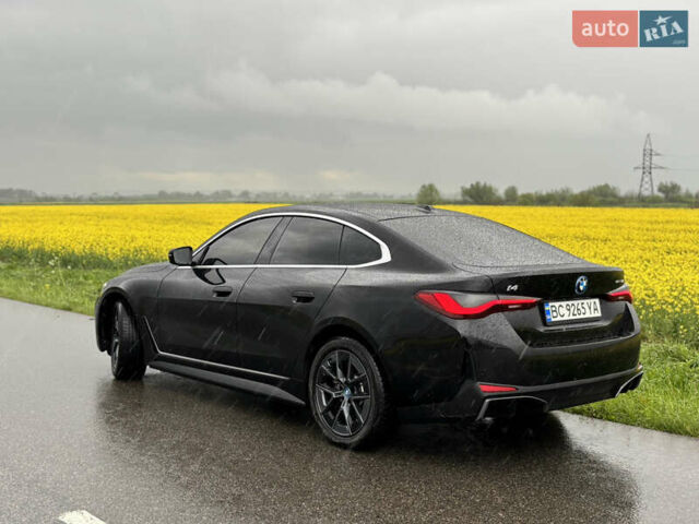 Черный БМВ i4, объемом двигателя 0 л и пробегом 7 тыс. км за 38200 $, фото 1 на Automoto.ua