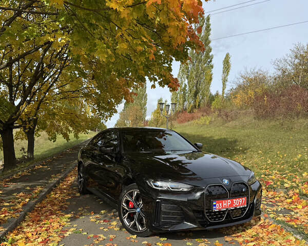 Черный БМВ i4, объемом двигателя 0 л и пробегом 45 тыс. км за 42500 $, фото 1 на Automoto.ua