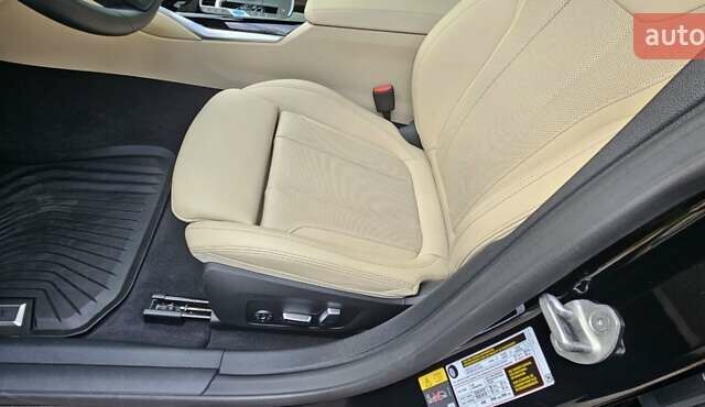 Черный БМВ i4, объемом двигателя 0 л и пробегом 33 тыс. км за 40000 $, фото 16 на Automoto.ua