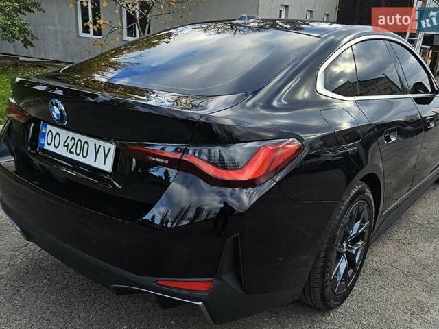 Черный БМВ i4, объемом двигателя 0 л и пробегом 33 тыс. км за 40000 $, фото 2 на Automoto.ua
