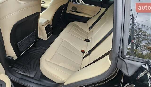 Черный БМВ i4, объемом двигателя 0 л и пробегом 33 тыс. км за 40000 $, фото 5 на Automoto.ua