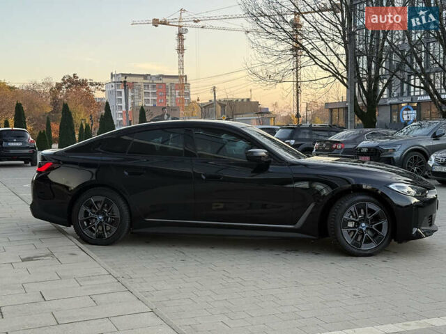 Черный БМВ i4, объемом двигателя 0 л и пробегом 17 тыс. км за 31999 $, фото 2 на Automoto.ua