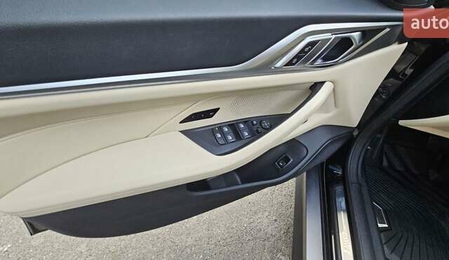 Черный БМВ i4, объемом двигателя 0 л и пробегом 33 тыс. км за 40000 $, фото 12 на Automoto.ua