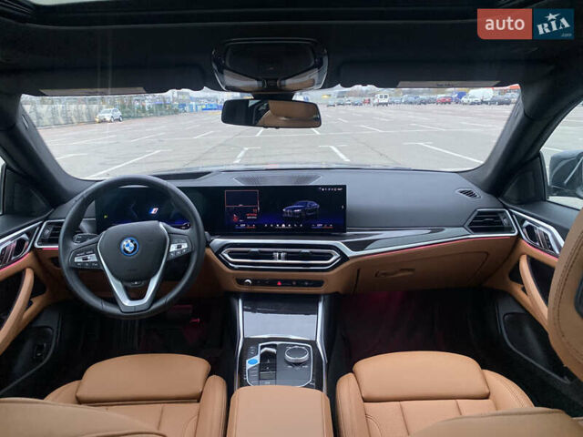 Черный БМВ i4, объемом двигателя 0 л и пробегом 10 тыс. км за 35400 $, фото 5 на Automoto.ua