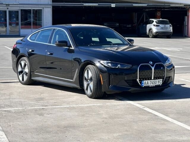 Черный БМВ i4, объемом двигателя 0 л и пробегом 13 тыс. км за 45999 $, фото 1 на Automoto.ua