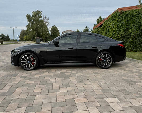 Черный БМВ i4, объемом двигателя 0 л и пробегом 1 тыс. км за 57000 $, фото 4 на Automoto.ua