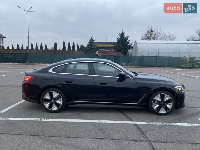 Черный БМВ i4, объемом двигателя 0 л и пробегом 10 тыс. км за 35400 $, фото 1 на Automoto.ua
