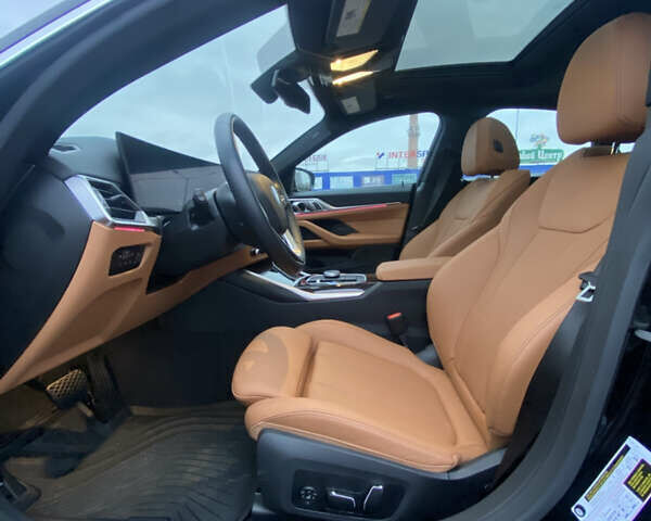 Черный БМВ i4, объемом двигателя 0 л и пробегом 10 тыс. км за 35400 $, фото 6 на Automoto.ua