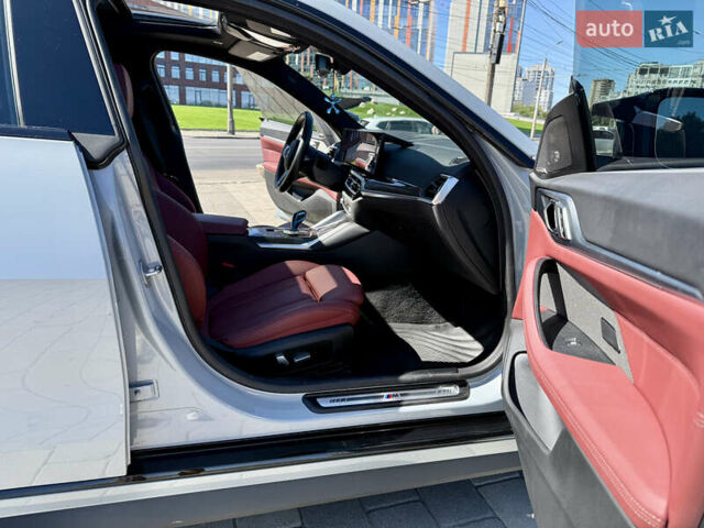 Серый БМВ i4, объемом двигателя 0 л и пробегом 34 тыс. км за 46500 $, фото 11 на Automoto.ua