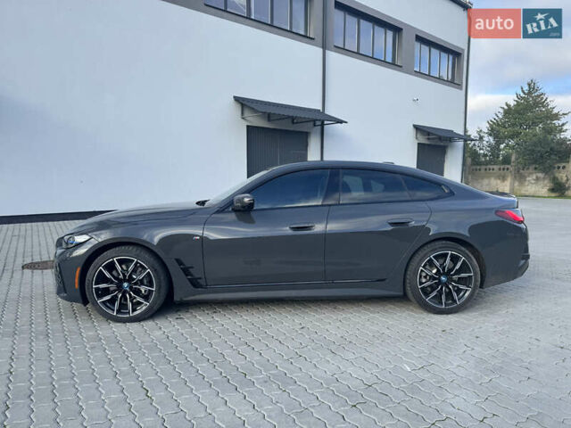 Серый БМВ i4, объемом двигателя 0 л и пробегом 22 тыс. км за 39500 $, фото 3 на Automoto.ua