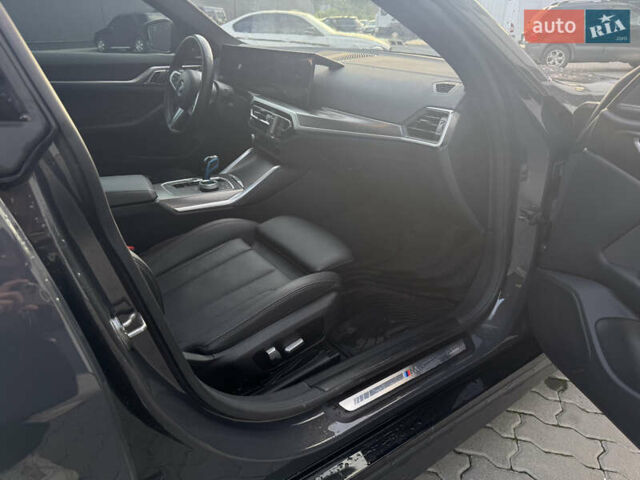 Серый БМВ i4, объемом двигателя 0 л и пробегом 22 тыс. км за 39500 $, фото 14 на Automoto.ua