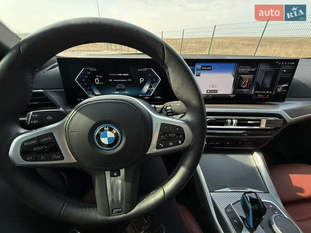 Серый БМВ i4, объемом двигателя 0 л и пробегом 33 тыс. км за 39500 $, фото 35 на Automoto.ua