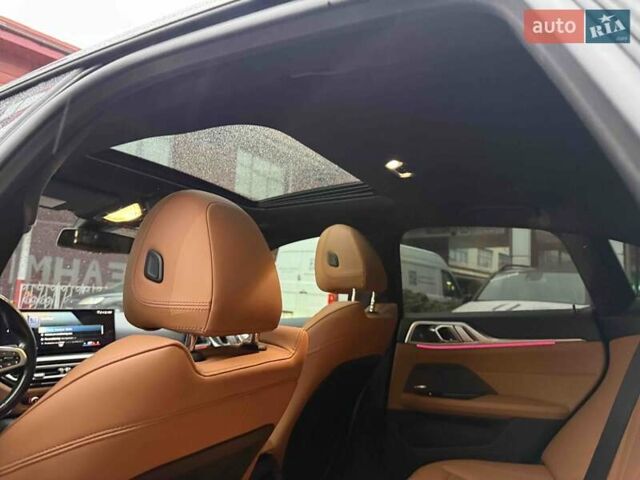 Серый БМВ i4, объемом двигателя 0 л и пробегом 47 тыс. км за 42900 $, фото 35 на Automoto.ua
