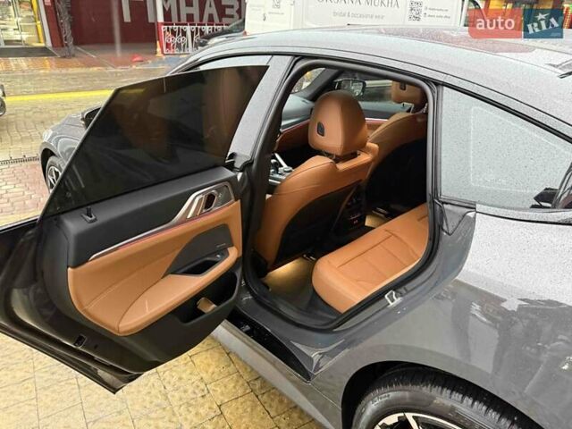 Серый БМВ i4, объемом двигателя 0 л и пробегом 47 тыс. км за 42900 $, фото 33 на Automoto.ua