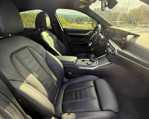 Серый БМВ i4, объемом двигателя 0 л и пробегом 26 тыс. км за 41499 $, фото 67 на Automoto.ua