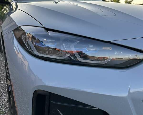 Серый БМВ i4, объемом двигателя 0 л и пробегом 36 тыс. км за 45999 $, фото 5 на Automoto.ua