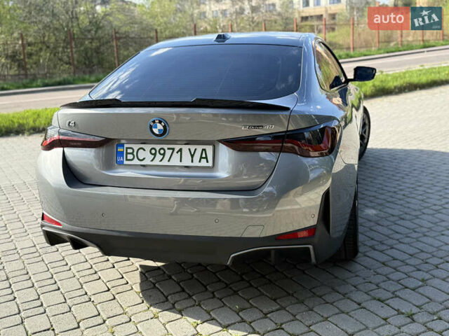 Серый БМВ i4, объемом двигателя 0 л и пробегом 26 тыс. км за 41499 $, фото 21 на Automoto.ua