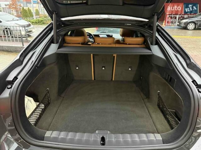 Серый БМВ i4, объемом двигателя 0 л и пробегом 47 тыс. км за 42900 $, фото 41 на Automoto.ua